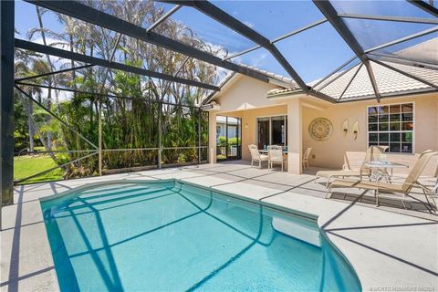 Photo of 830 NW Red Pine Way, Jensen Beach, FL 34957 (MLS # M20055312)