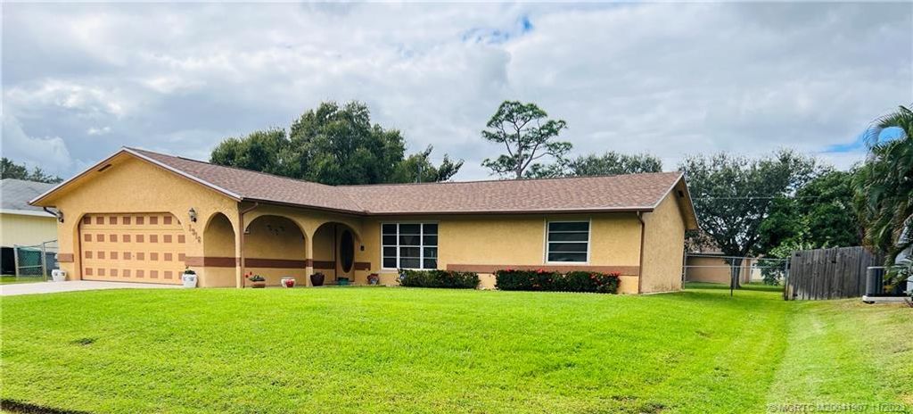 Photo of 1318 SW Dorchester Street, Port Saint Lucie, FL 34983 (MLS # M20041907)