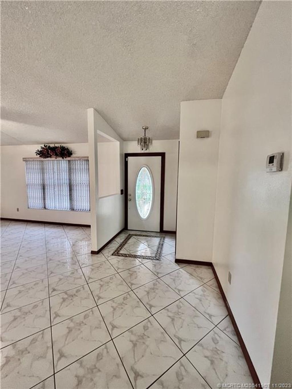Photo of 1318 SW Dorchester Street, Port Saint Lucie, FL 34983 (MLS # M20041907)