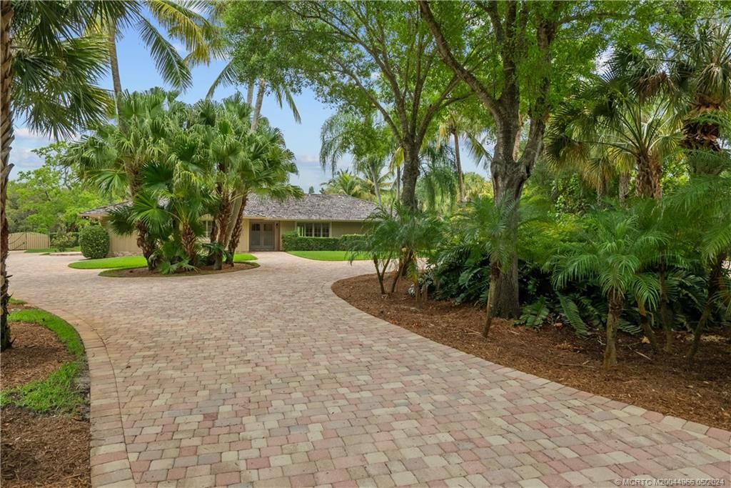 Photo of 875 NE Stokes Terrace, Jensen Beach, FL 34957 (MLS # M20044966)