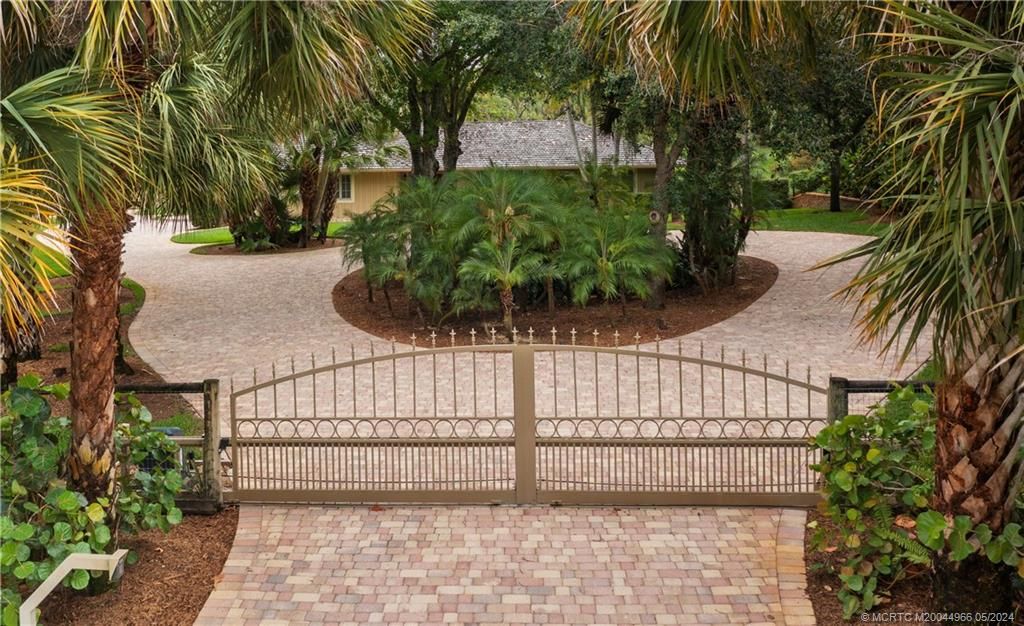 Photo of 875 NE Stokes Terrace, Jensen Beach, FL 34957 (MLS # M20044966)