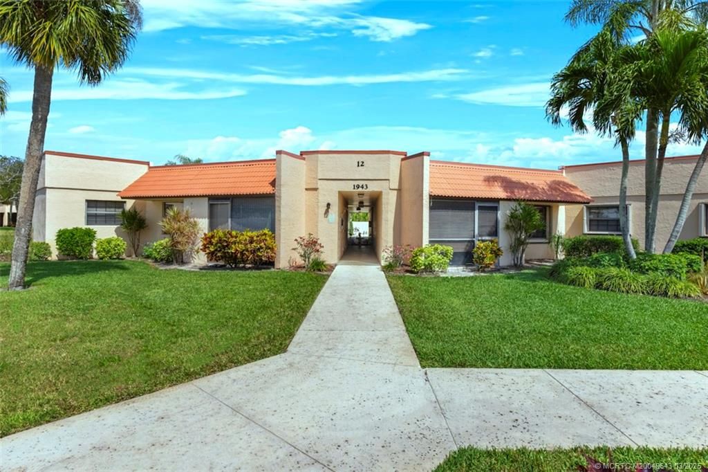 Photo of 1943 NE Collins Circle #12-40, Jensen Beach, FL 34957 (MLS # M20049643)
