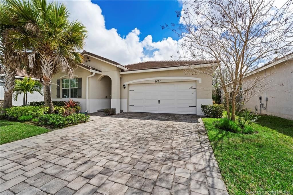 Photo of 7461 SW Harbor Cove Drive, Stuart, FL 34997 (MLS # M20054399)