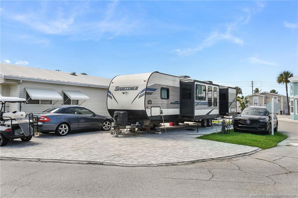 Photo of 944 Nettles Boulevard, Jensen Beach, FL 34957 (MLS # M20055937)