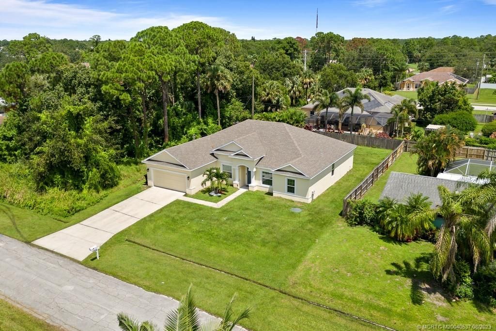 Photo of 1437 SW Goodman Avenue, Port Saint Lucie, FL 34953 (MLS # M20040537)