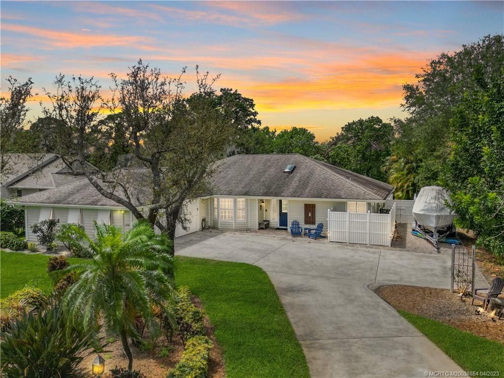 Photo of 1026 SW Magnolia Bluff Drive, Palm City, FL 34990 (MLS # M20038854)