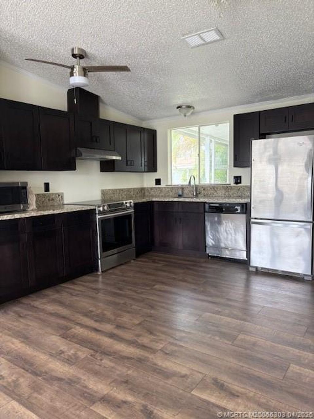 Photo of 410 SW 134 Way, Davie, FL 33325 (MLS # M20055303)