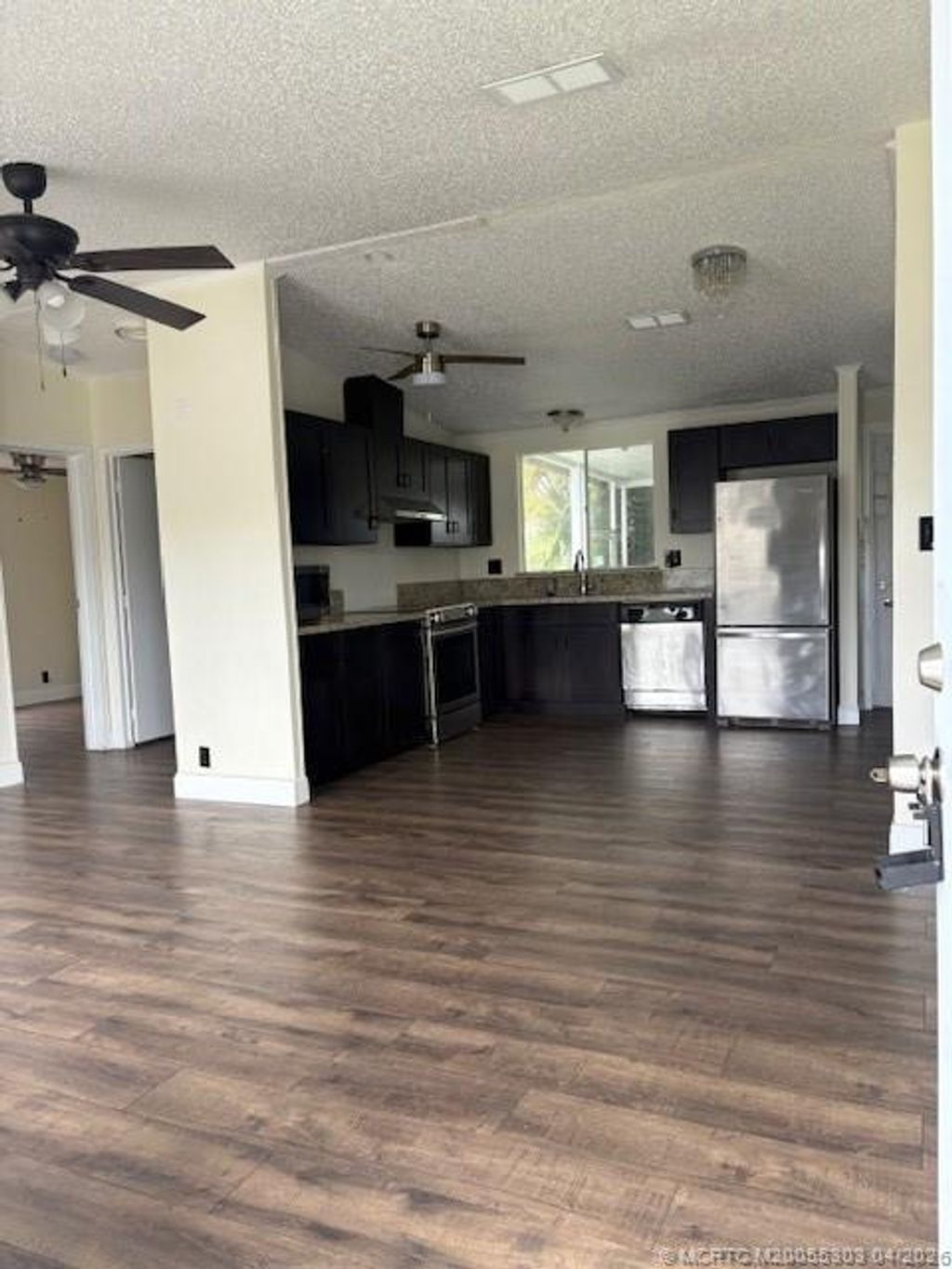 Photo of 410 SW 134 Way, Davie, FL 33325 (MLS # M20055303)