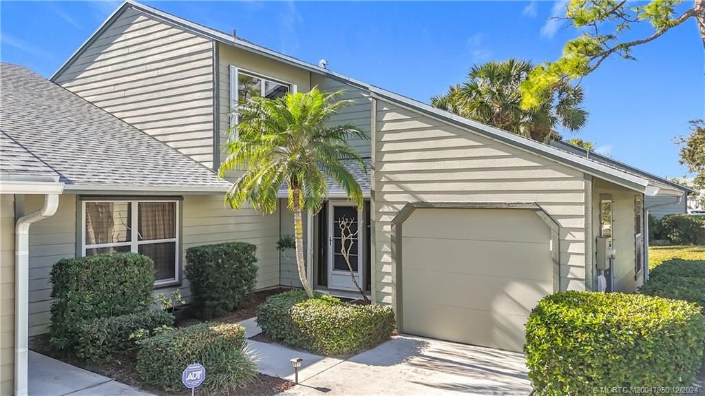 Photo of 910 NE Sandalwood Place, Jensen Beach, FL 34957 (MLS # M20047950)