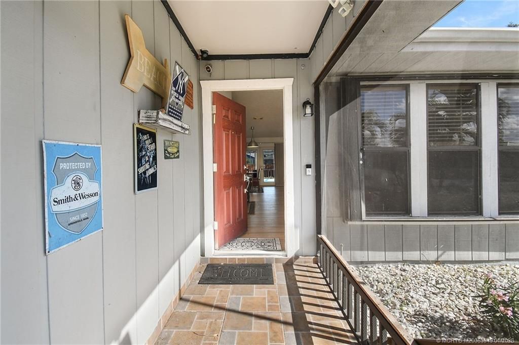 Photo of 2281 SE McMaster Street, Port Saint Lucie, FL 34952 (MLS # M20053949)