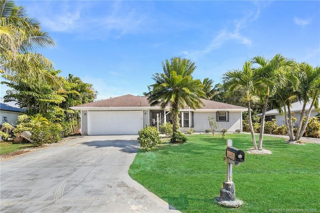 Photo of 2281 SE McMaster Street, Port Saint Lucie, FL 34952 (MLS # M20053949)