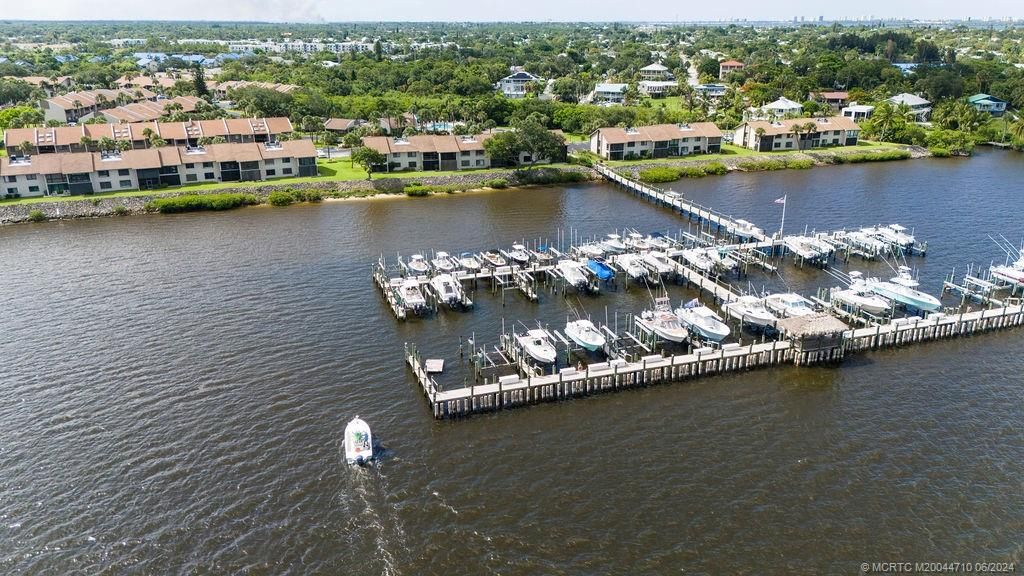 Photo of 1600 NE Dixie Highway #1-102, Jensen Beach, FL 34957 (MLS # M20044710)