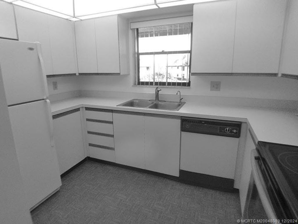 Photo of 641 SW South River Drive #203, Stuart, FL 34997 (MLS # M20048089)