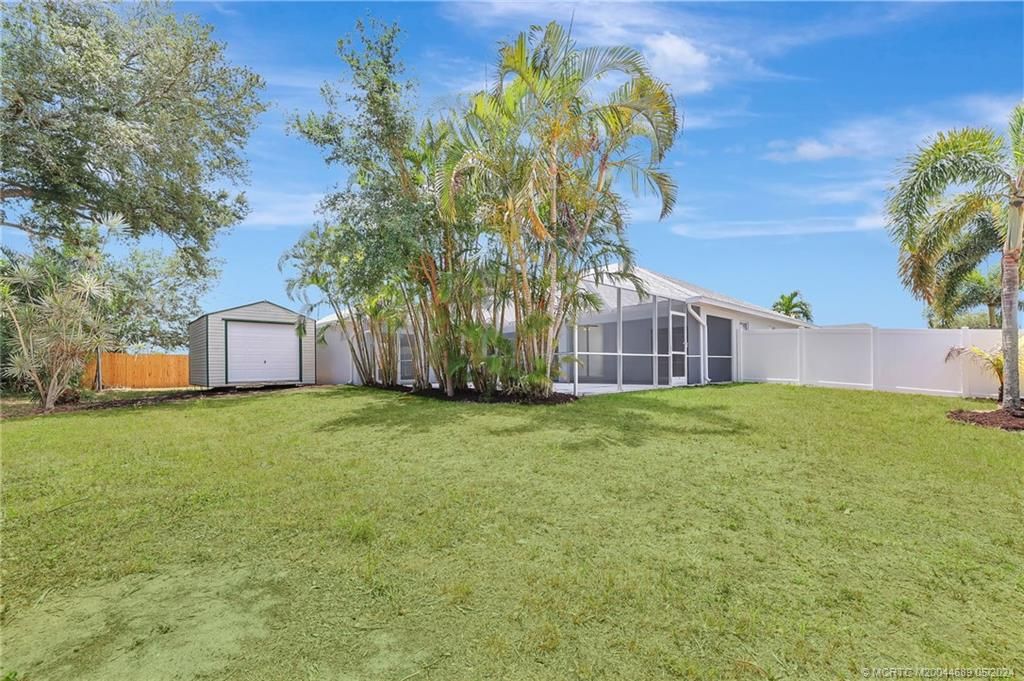 Photo of 601 SW Cynthia Street, Port Saint Lucie, FL 34983 (MLS # M20044689)