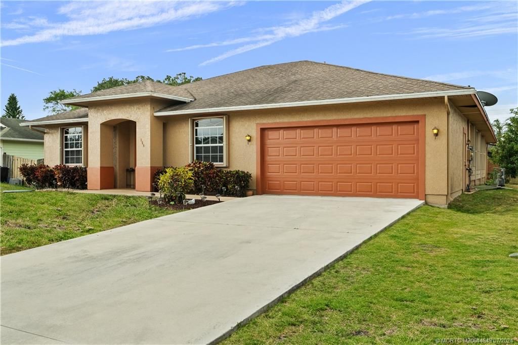 Photo of 150 SW Fairchild Avenue, Port Saint Lucie, FL 34984 (MLS # M20044649)