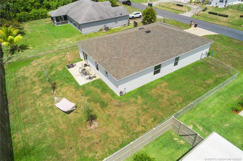 Photo of 1514 SW Kosnar Avenue, Port Saint Lucie, FL 34953 (MLS # M20041349)
