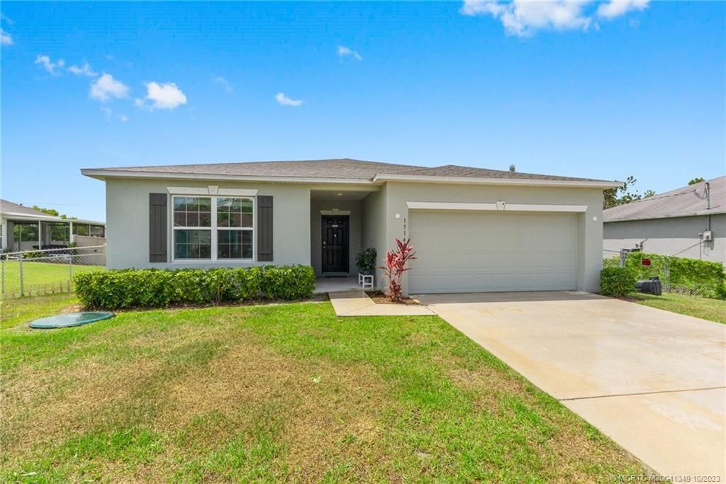 Photo of 1514 SW Kosnar Avenue, Port Saint Lucie, FL 34953 (MLS # M20041349)