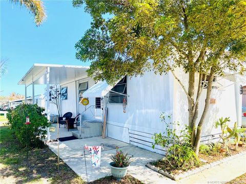 Photo of 608 Garden View Way NE, Jensen Beach, FL 34957 (MLS # M20054794)