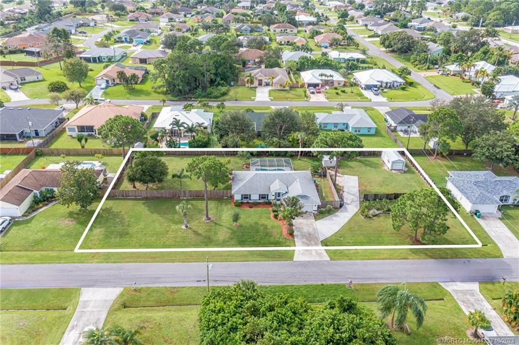 Photo of 1622 SW Alvaton Avenue, Port Saint Lucie, FL 34953 (MLS # M20041333)