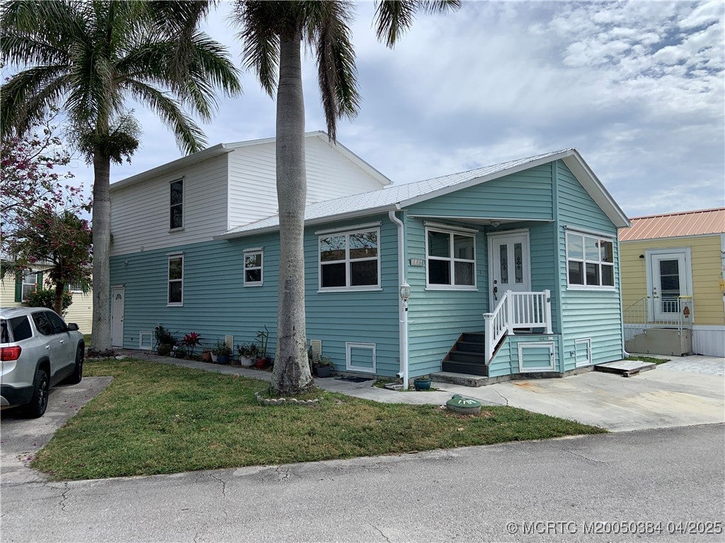 Photo of 1156 Nettles Boulevard, Jensen Beach, FL 34957 (MLS # M20050384)