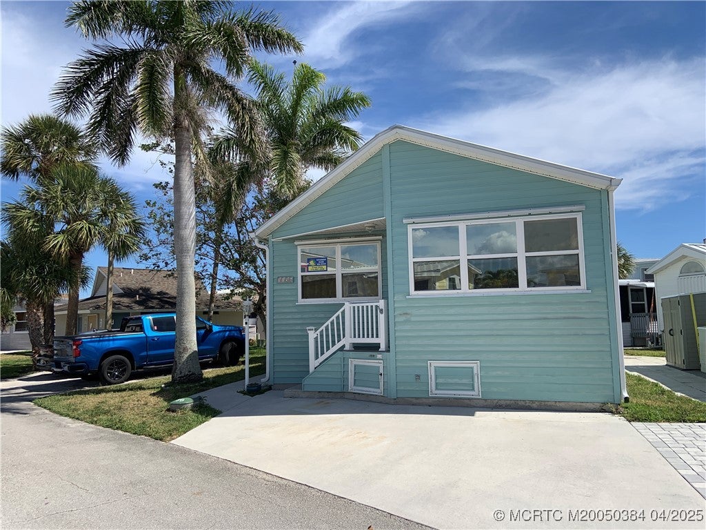Photo of 1156 Nettles Boulevard, Jensen Beach, FL 34957 (MLS # M20050384)