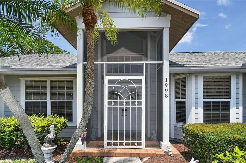 Photo of 1998 SE Floresta Drive, Port Saint Lucie, FL 34983 (MLS # M20045073)