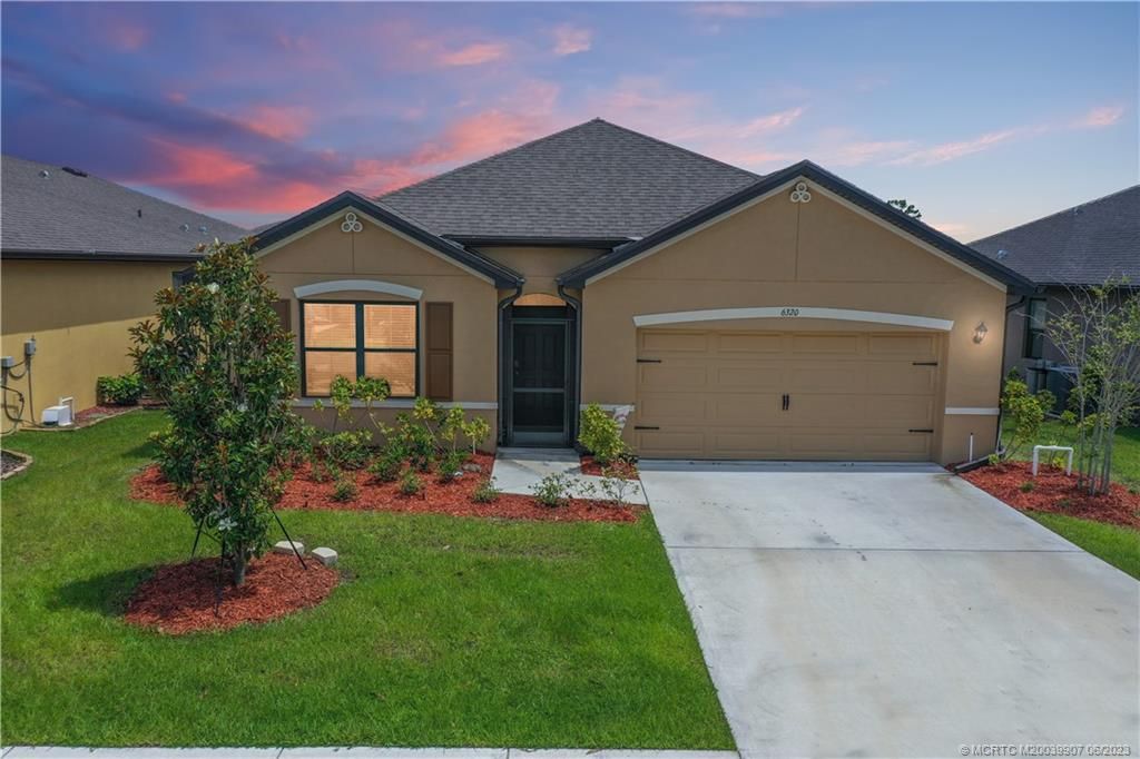 Photo of 6320 NW Northwood Loop, Port Saint Lucie, FL 34983 (MLS # M20039907)