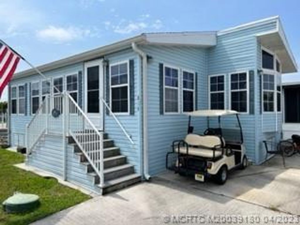 Photo of 876 Nettles Boulevard, Jensen Beach, FL 34957 (MLS # M20039180)