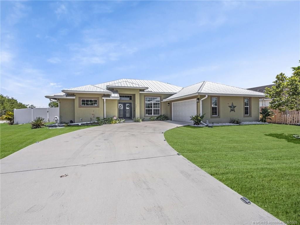 Photo of 4201 SW Yalta Street, Port Saint Lucie, FL 34953 (MLS # M20050475)