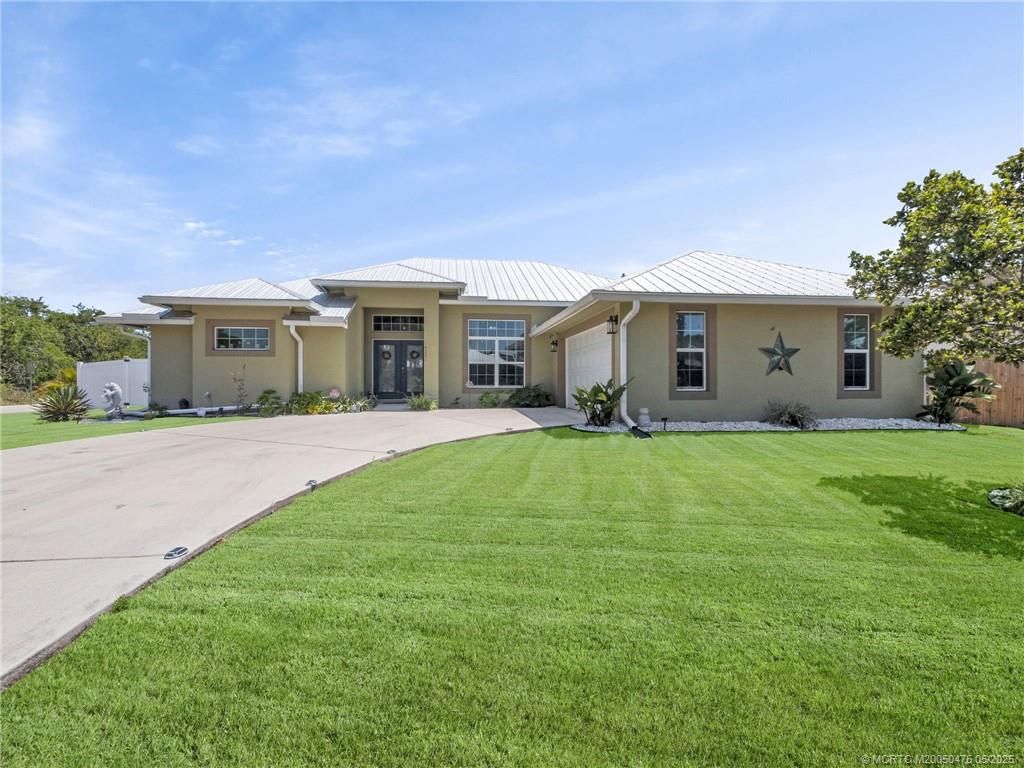 Photo of 4201 SW Yalta Street, Port Saint Lucie, FL 34953 (MLS # M20050475)