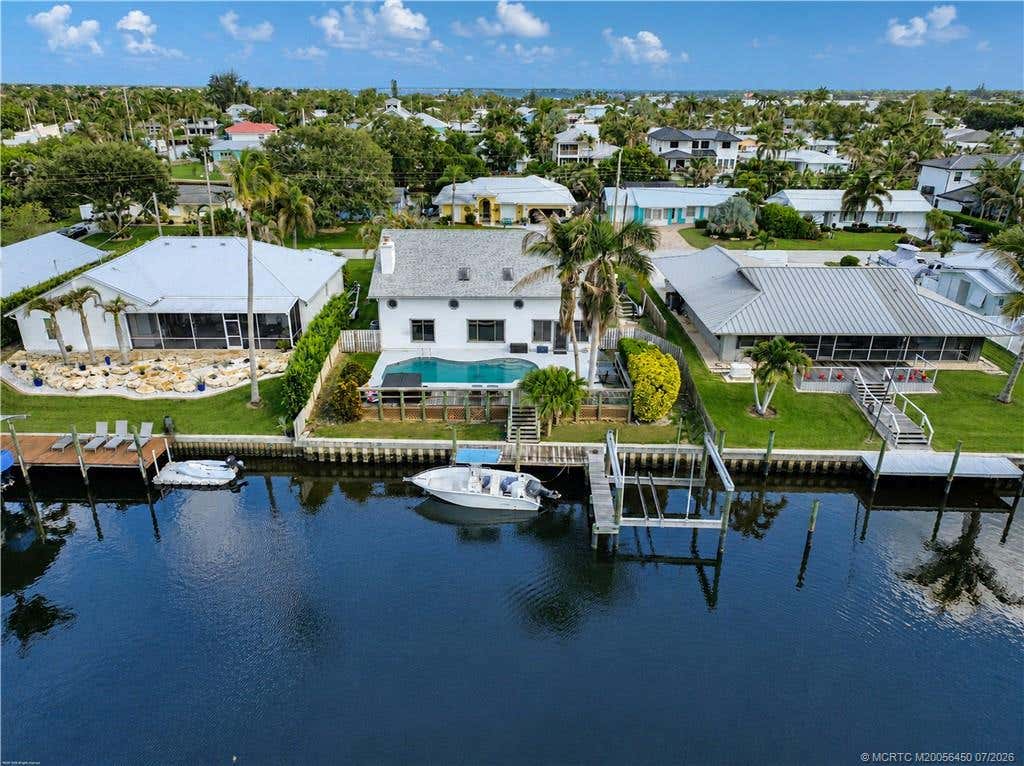 Photo of 1614 SW Seagull Way, Palm City, FL 34990 (MLS # M20056450)