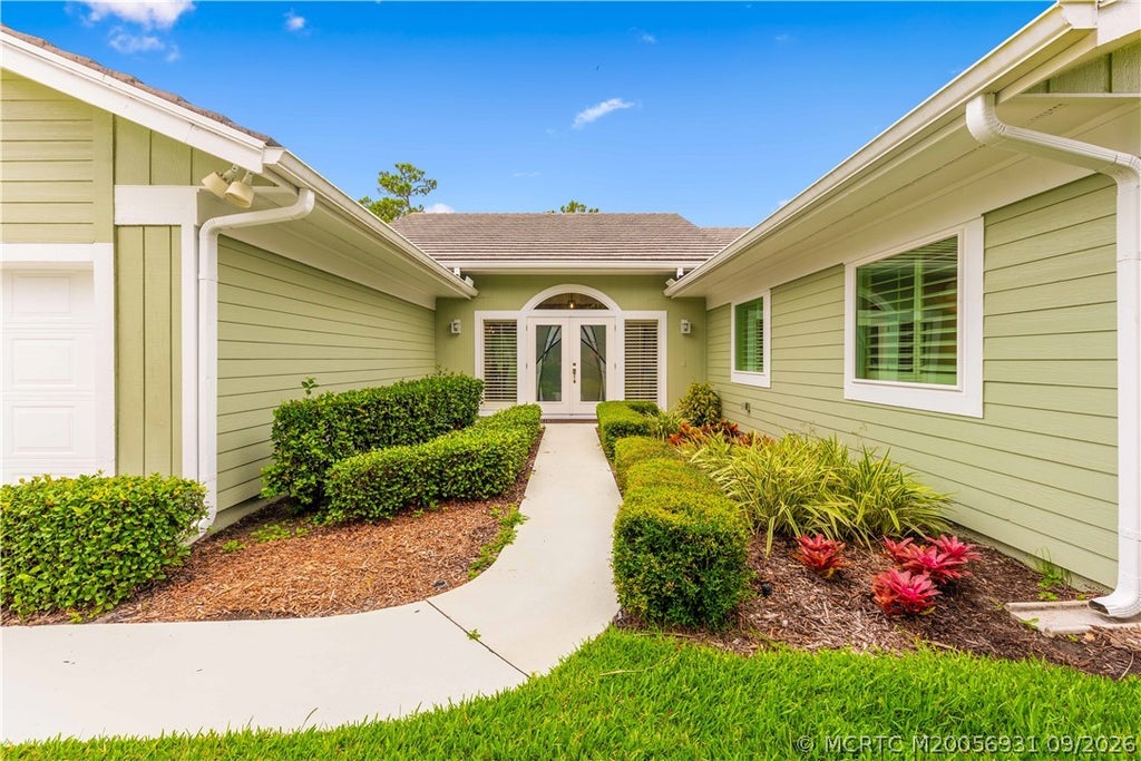 Photo of 12813 NW Cinnamon Way, Palm City, FL 34990 (MLS # M20056931)