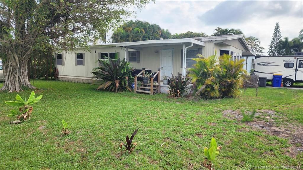 Photo of 2621 SE Galaxy Way, Stuart, FL 34997 (MLS # M20044985)