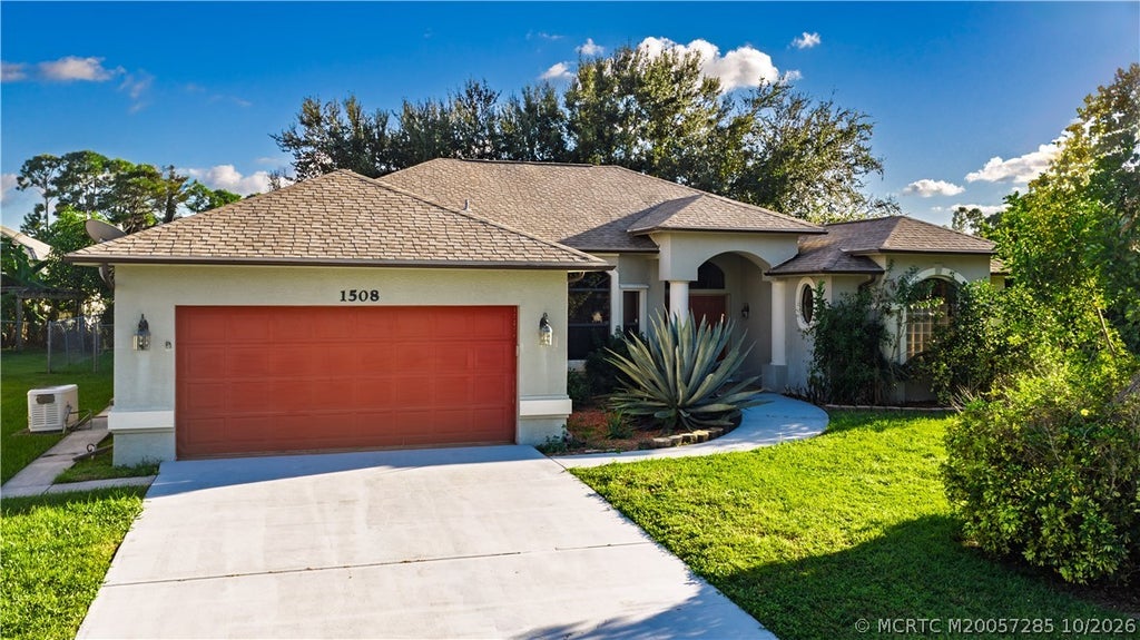 Photo of 1508 SW Crater Avenue, River Park, FL 34953 (MLS # M20057285)