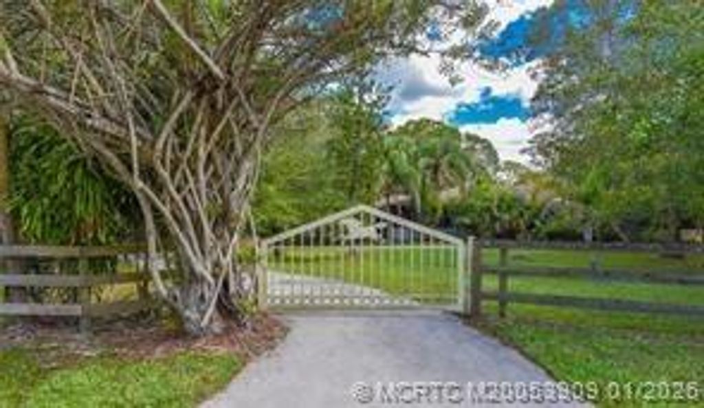 Photo of 11165 SW Meadowlark Circle, Stuart, FL 34997 (MLS # M20053909)