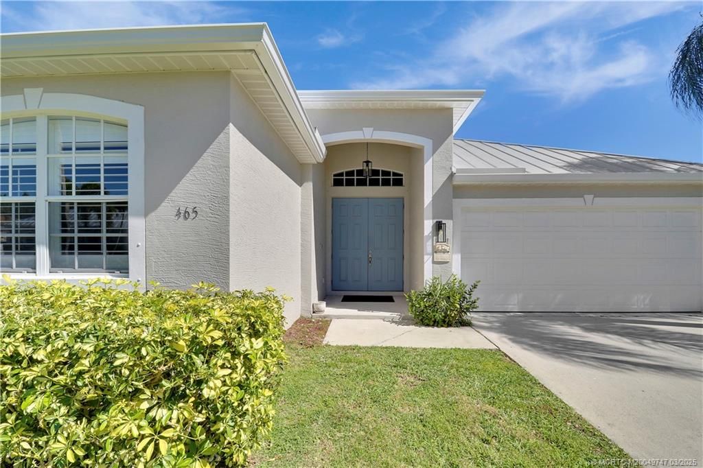 Photo of 465 NW Sunflower Place, Jensen Beach, FL 34957 (MLS # M20049747)