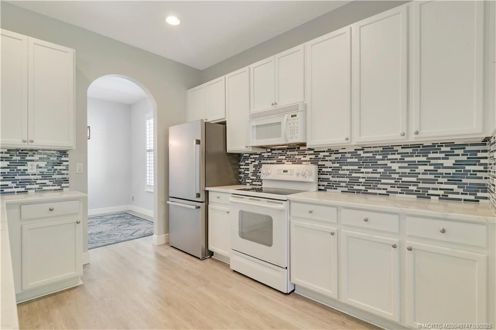 Photo of 465 NW Sunflower Place, Jensen Beach, FL 34957 (MLS # M20049747)