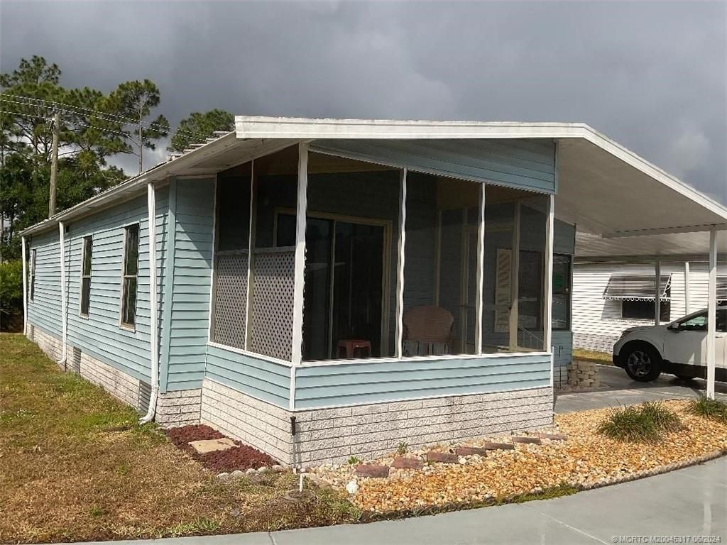 Photo of 16332 SW Indianwood Circle, Indiantown, FL 34956 (MLS # M20045317)