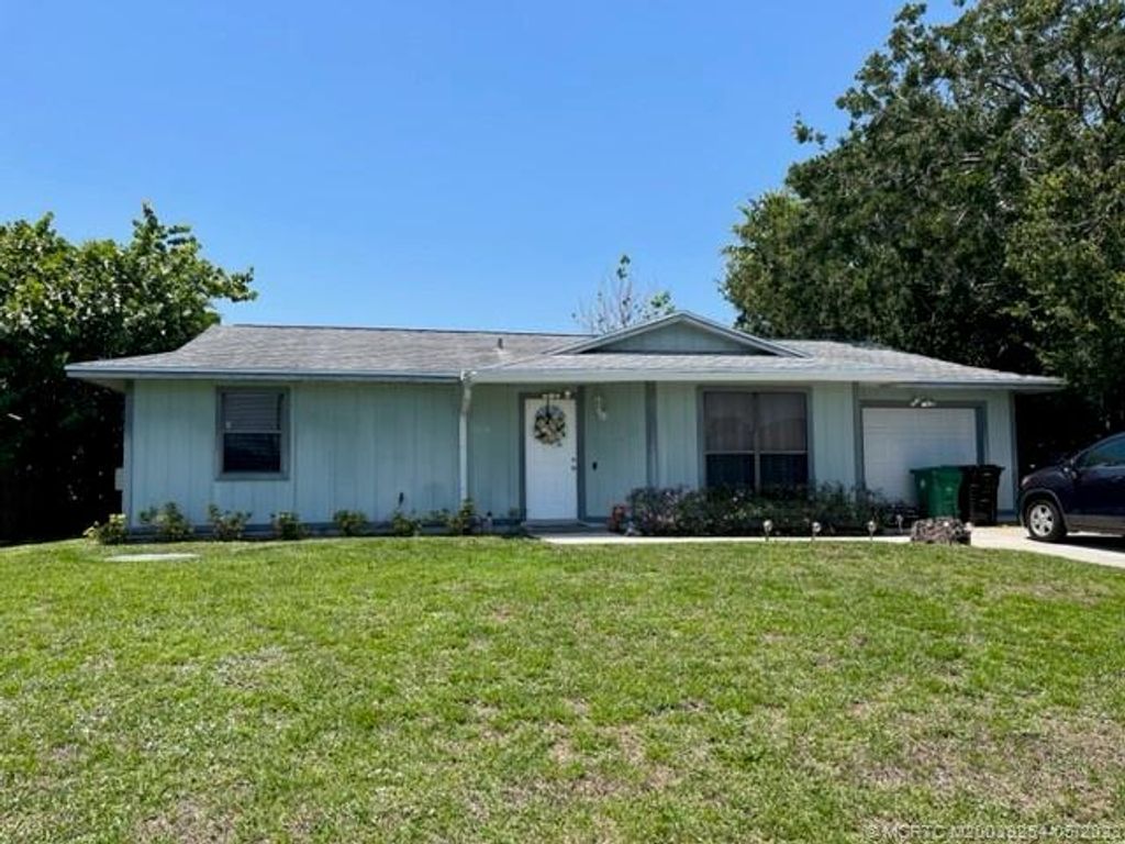 Photo of 1826 SW Cycle Street, Port Saint Lucie, FL 34953 (MLS # M20039254)