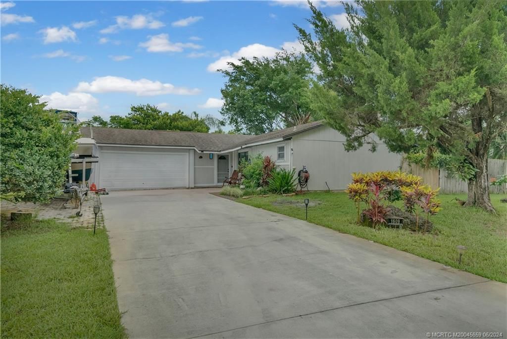 Photo of 1609 SW Brisbane Street, Port Saint Lucie, FL 34984 (MLS # M20045659)