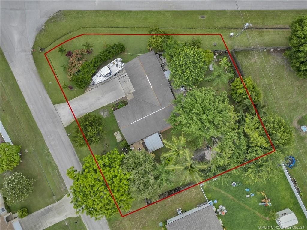 Photo of 1609 SW Brisbane Street, Port Saint Lucie, FL 34984 (MLS # M20045659)