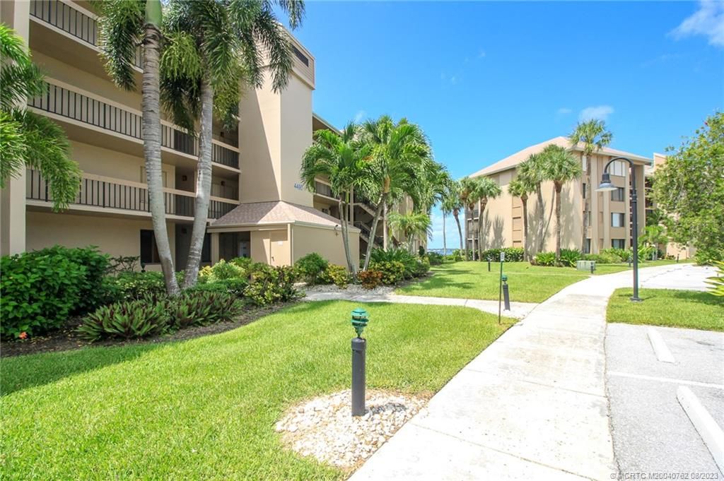 Photo of 4490 NE Sandpebble Trace #8-405, Stuart, FL 34996 (MLS # M20040762)