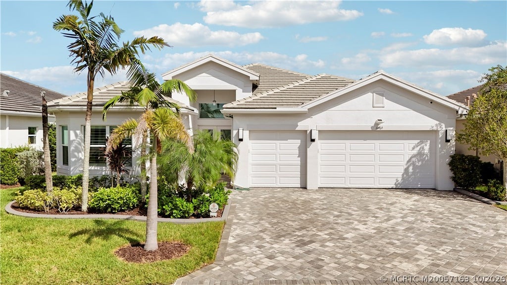 Photo of 11969 SW Hunter Hill Avenue, Port Saint Lucie, FL 34987 (MLS # M20057163)