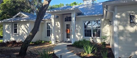 Photo of 1418 NE Oak Bluff Lane, Jensen Beach, FL 34957 (MLS # M20052697)