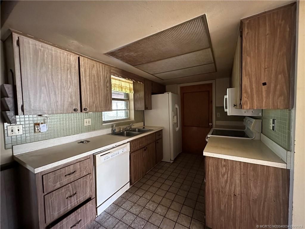 Photo of 507 Coconut Avenue E, Port Saint Lucie, FL 34952 (MLS # M20040034)