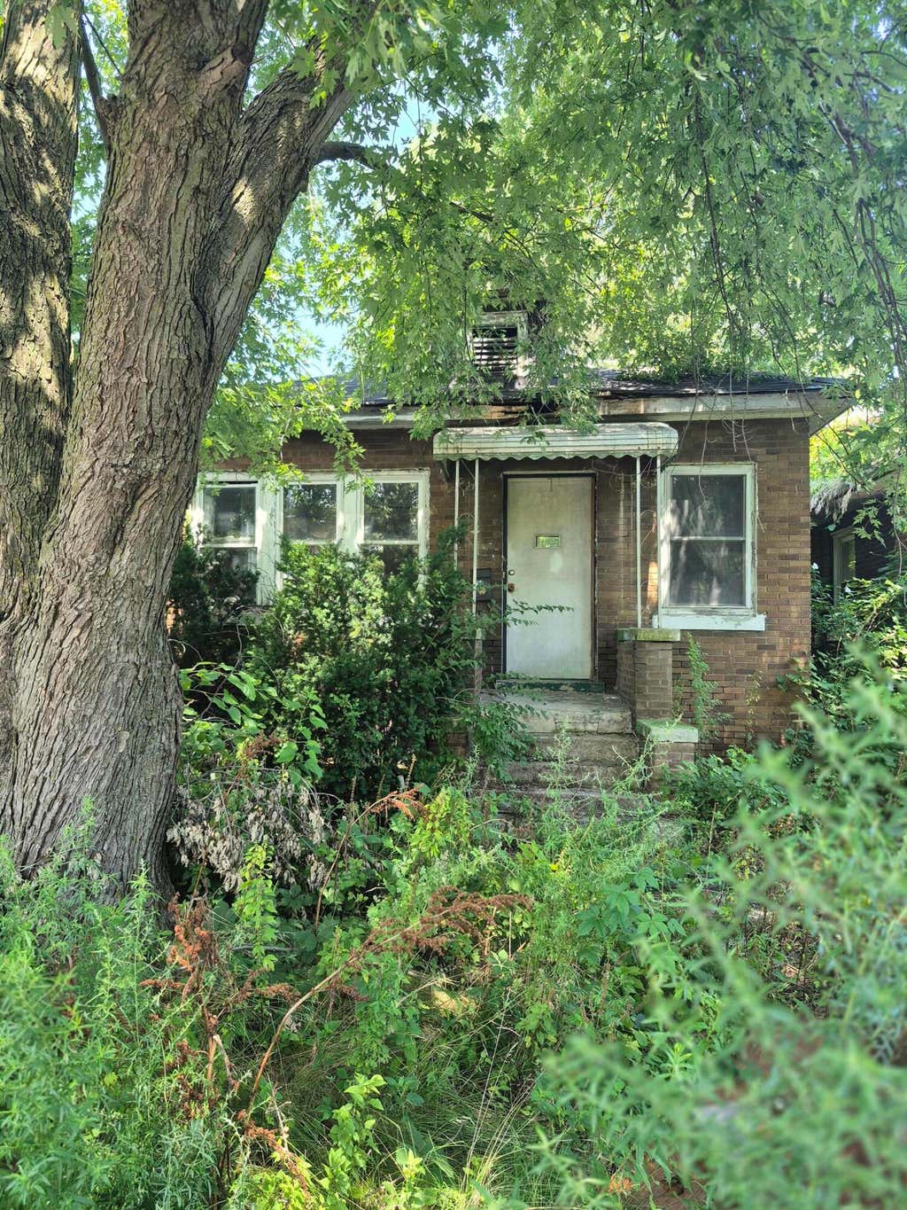 Photo of 2154 W 10th Place, Gary, IN 46404 (MLS # 843423)