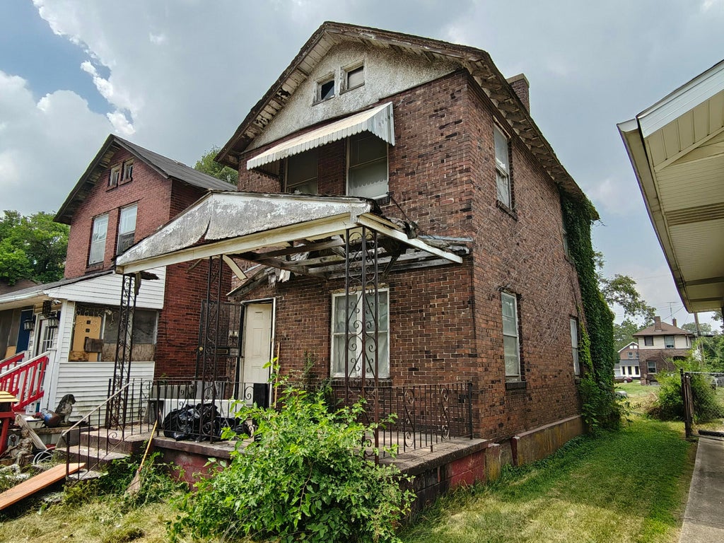 Photo of 216 Ellsworth Street, Gary, IN 46404 (MLS # 845600)