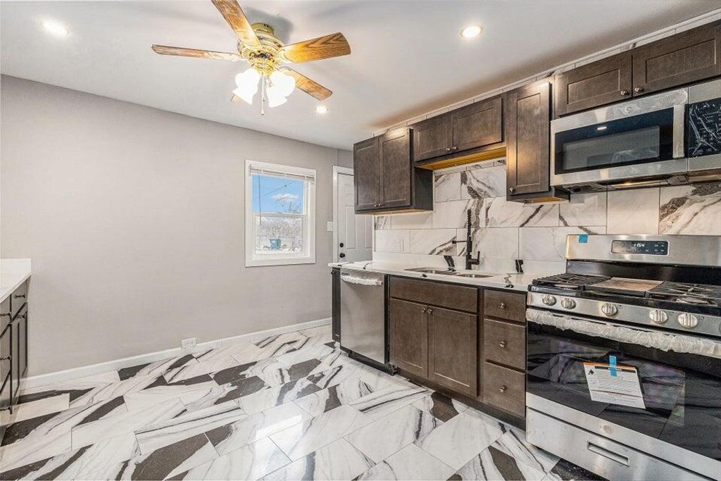 Photo of 5207 W 4th Place, Gary, IN 46406 (MLS # 836348)