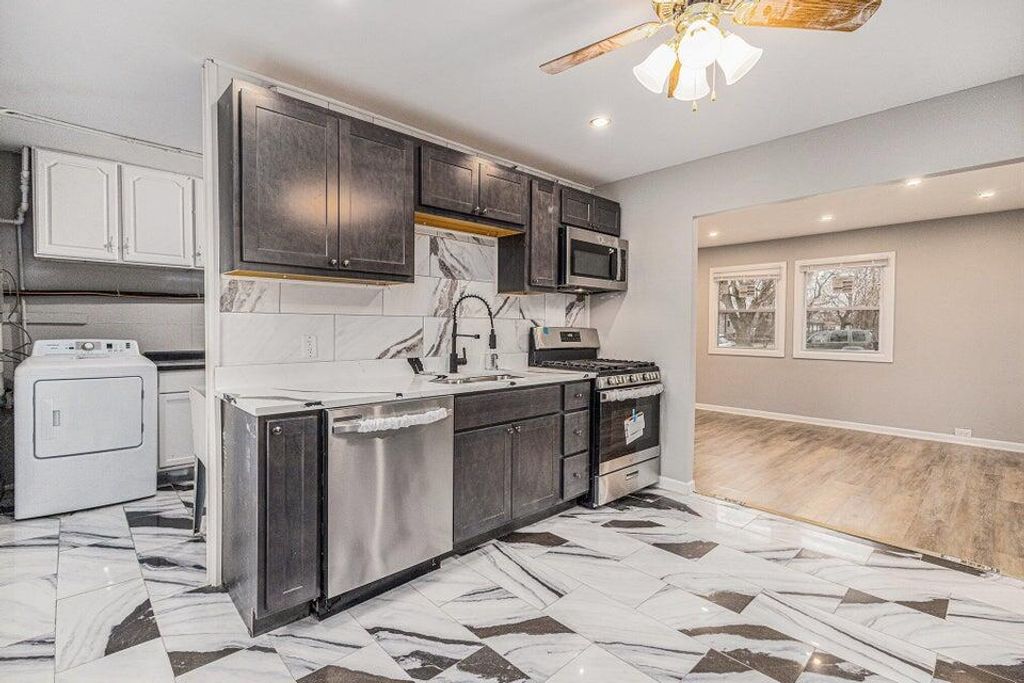 Photo of 5207 W 4th Place, Gary, IN 46406 (MLS # 836348)