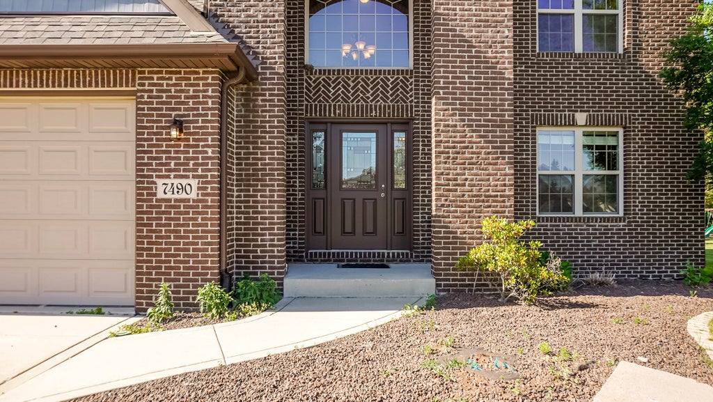 Photo of 7490 E 103rd Avenue, Crown Point, IN 46307 (MLS # 840232)